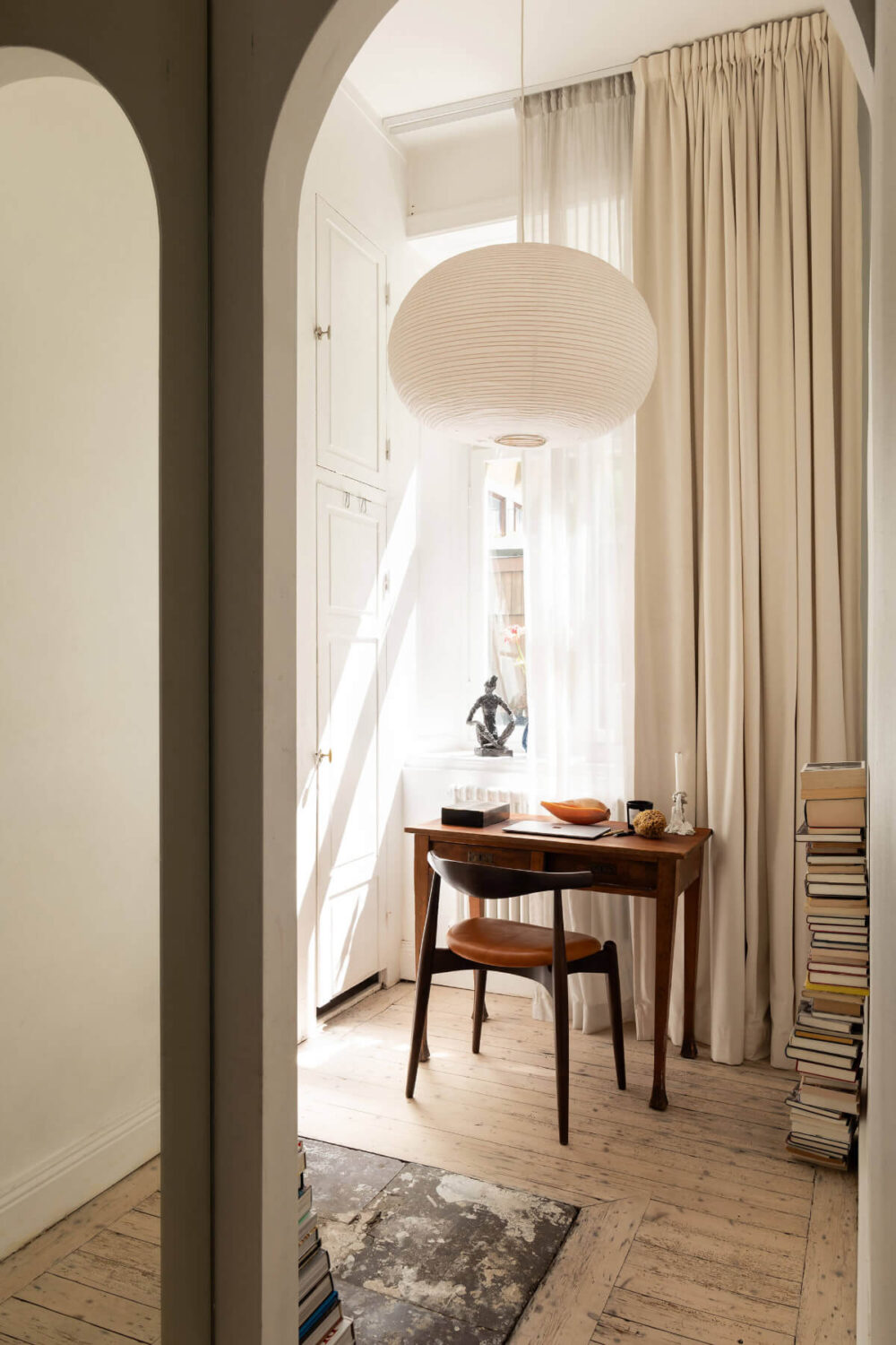 Arches and a Wall Mural in a Swedish Apartment 18 home office built-in cabinets