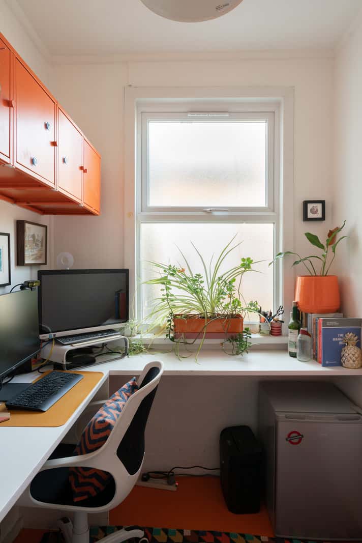 A Colorful Home with a Gold Extension in North London 22 home office orange cabinets