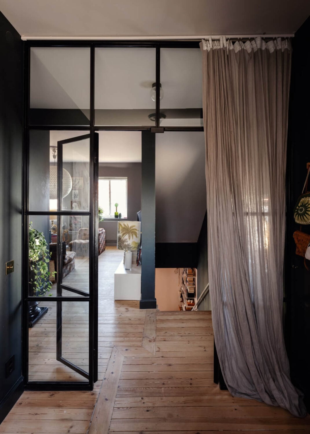 An Amazing Swedish House with Pink and Gray Rooms 17 industrial steel glass doors