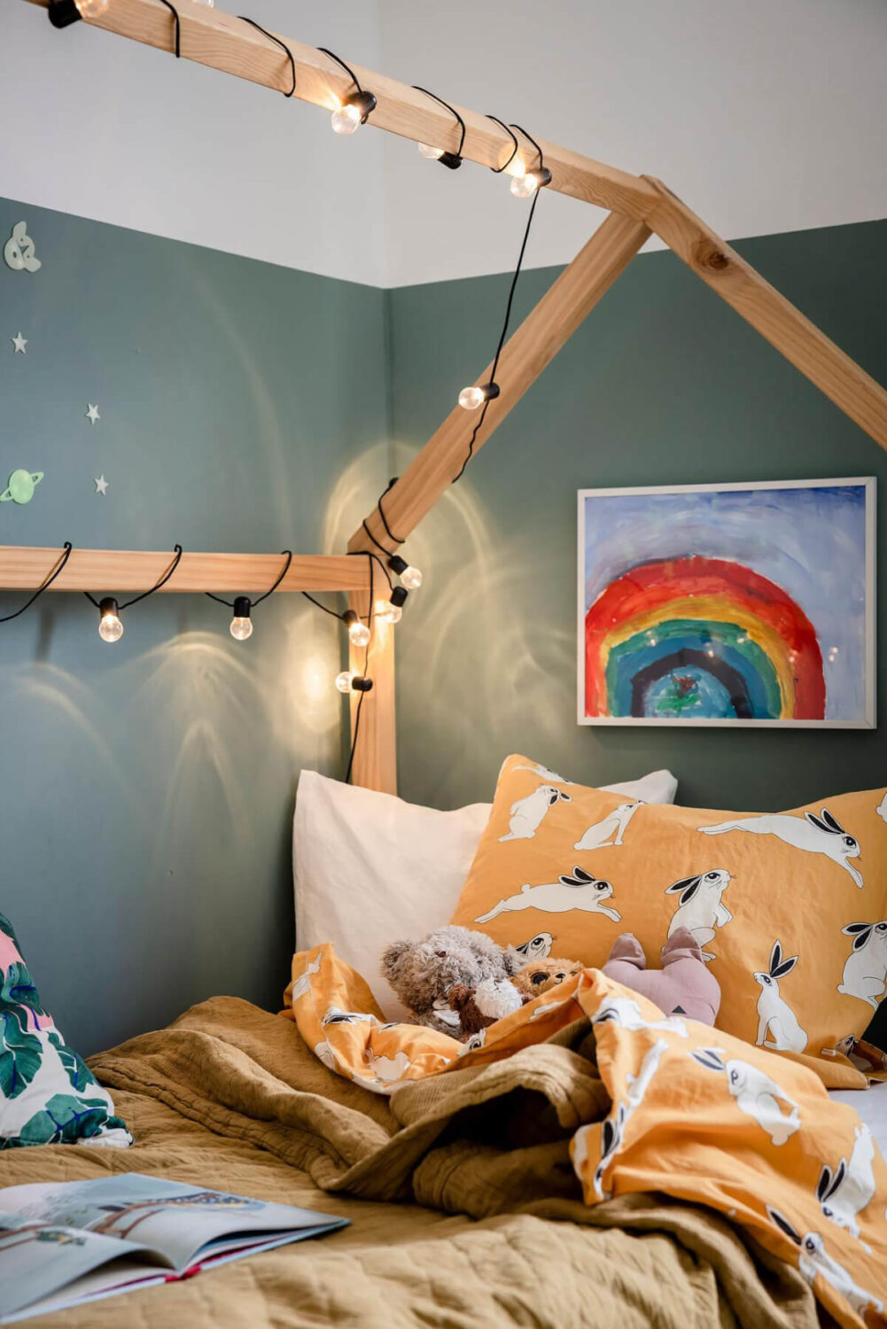 Timeless Charm and Contemporary Design in a 1930s Duplex Apartment 26 kids bed with string lights