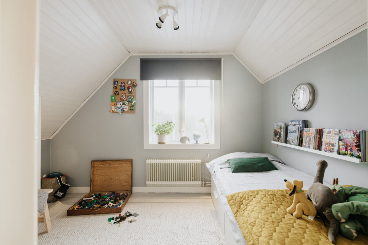 Light-Filled Rooms in a Charming 1907 Swedish Villa 28 kids bedroom slanted ceiling