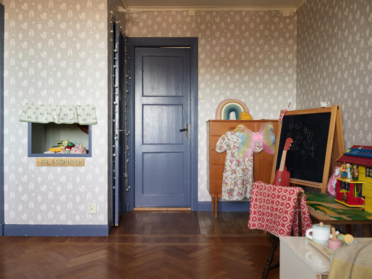 A Grand Family Home in a Former Swedish Doctor's Villa 38 kids bedroom wallpaper blue joinery