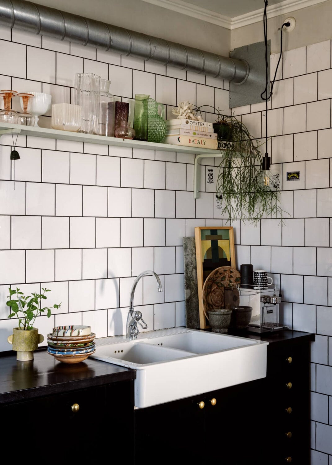 An Amazing Swedish House with Pink and Gray Rooms 11 kitchen black cabinets white tiles