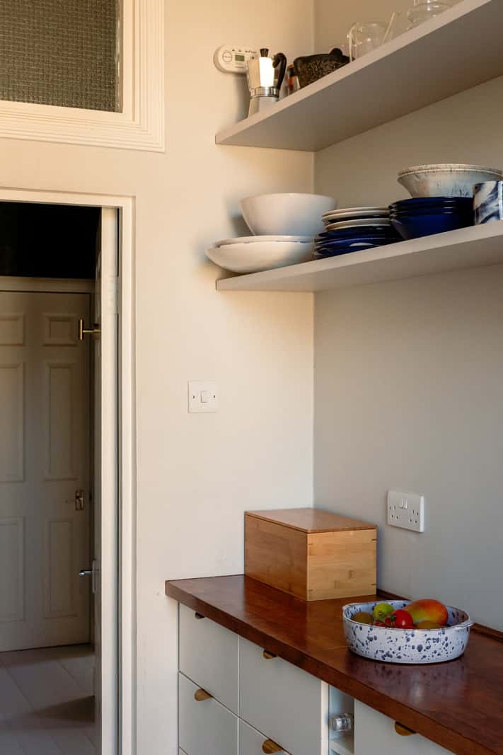 A Corner Apartment with Large Windows in a Former London Pub 9 kitchen cabinets and shelves