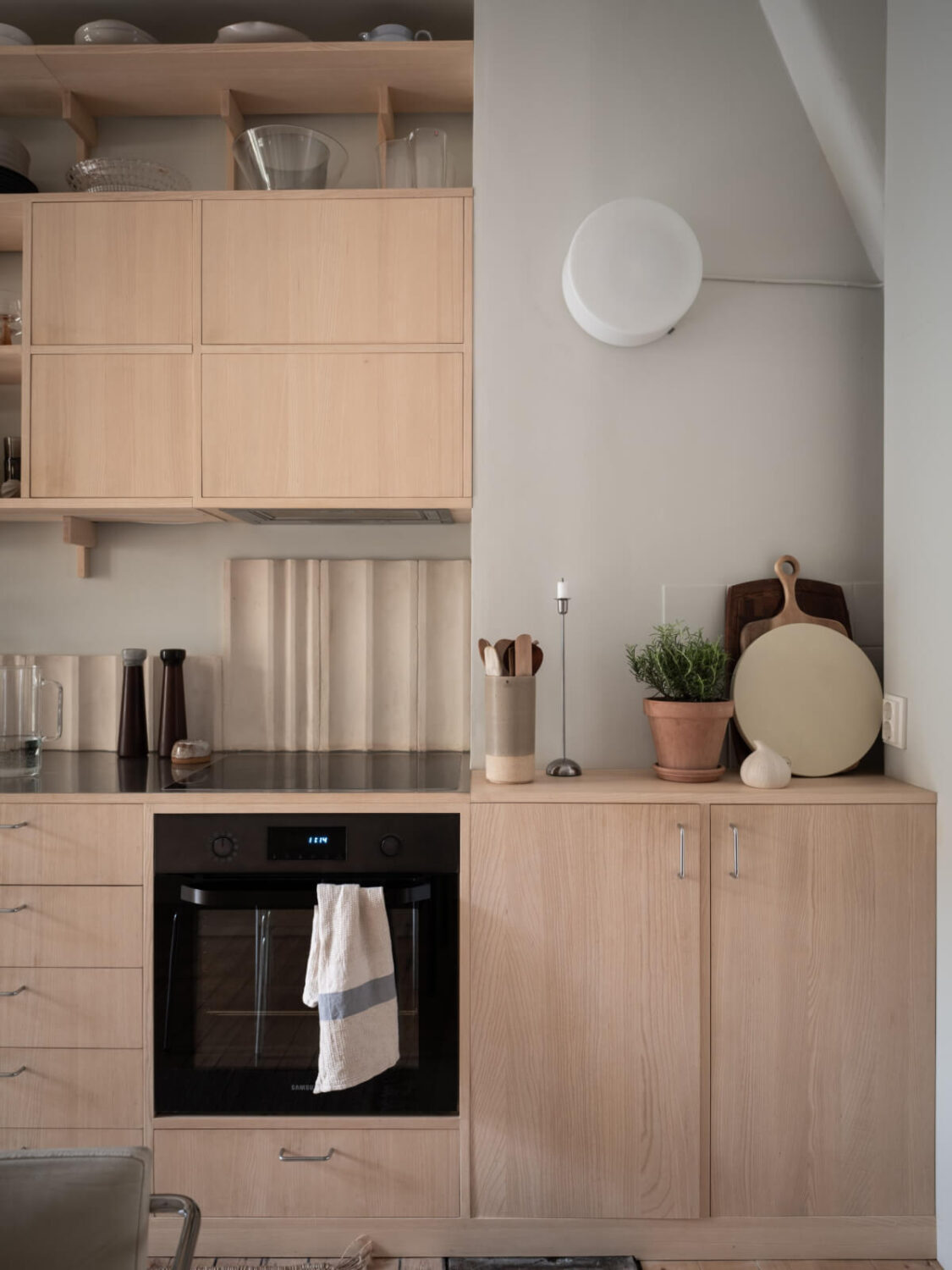 A Calm Color Palette in a Charming Swedish Apartment 14 kitchen detail