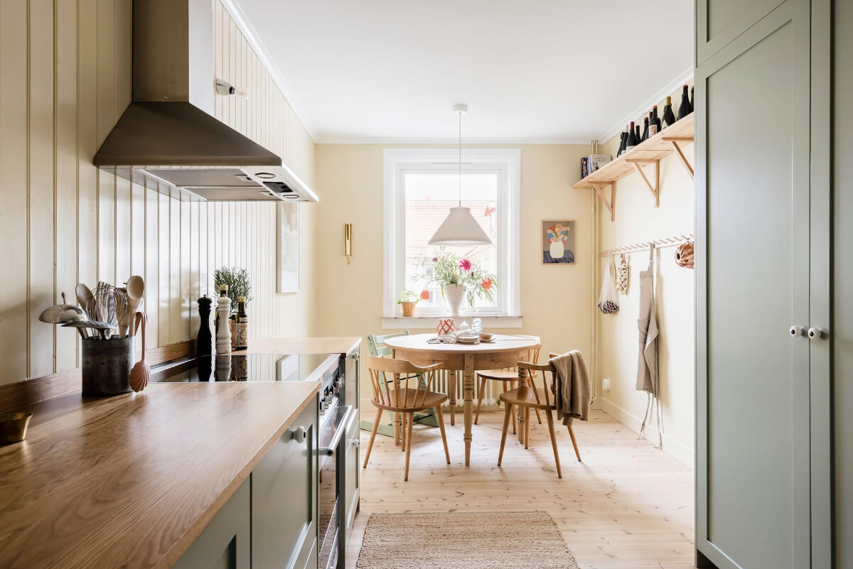 Timeless Charm and Contemporary Design in a 1930s Duplex Apartment 6 kitchen pale yellow walls