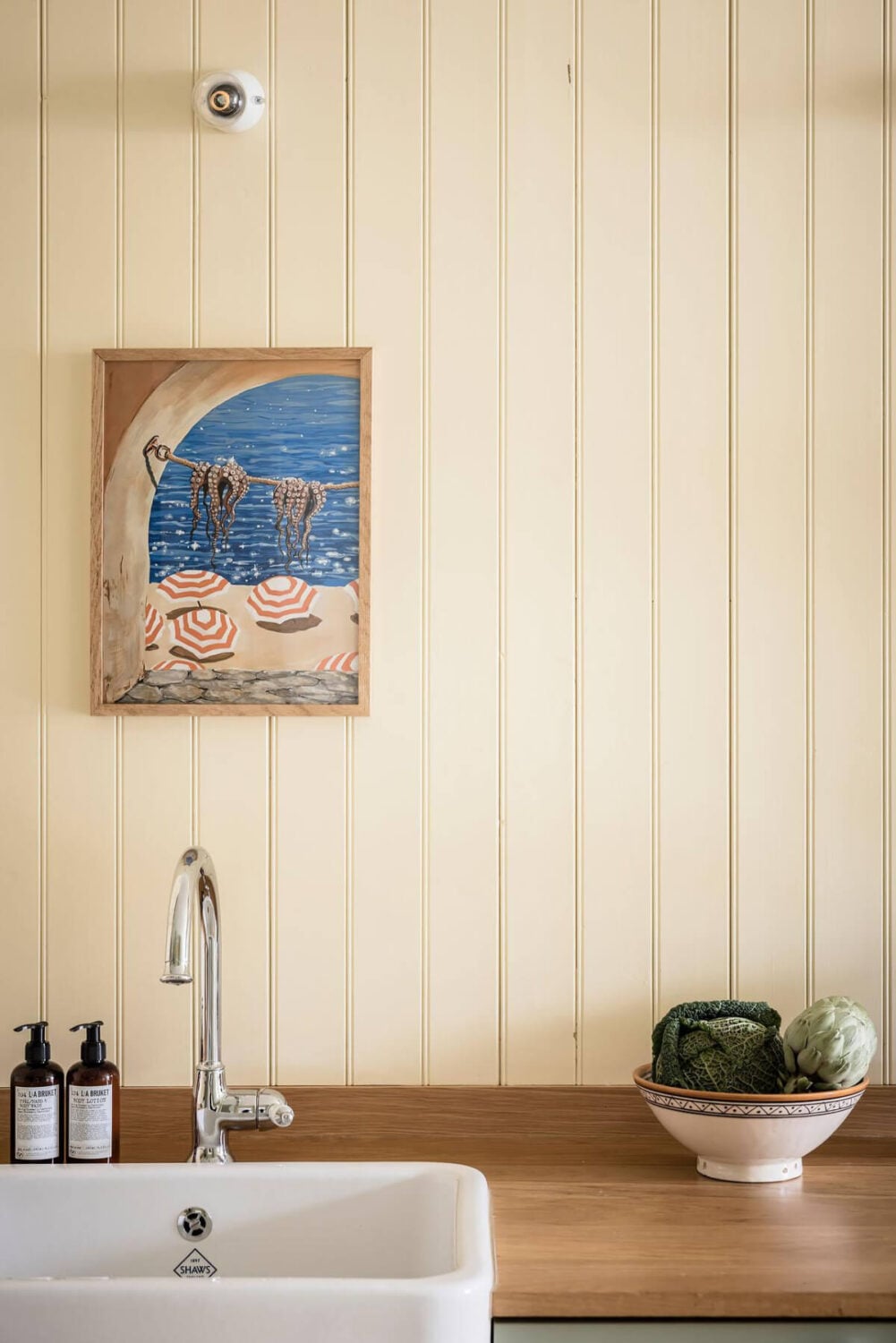 Timeless Charm and Contemporary Design in a 1930s Duplex Apartment 5 kitchen paneling
