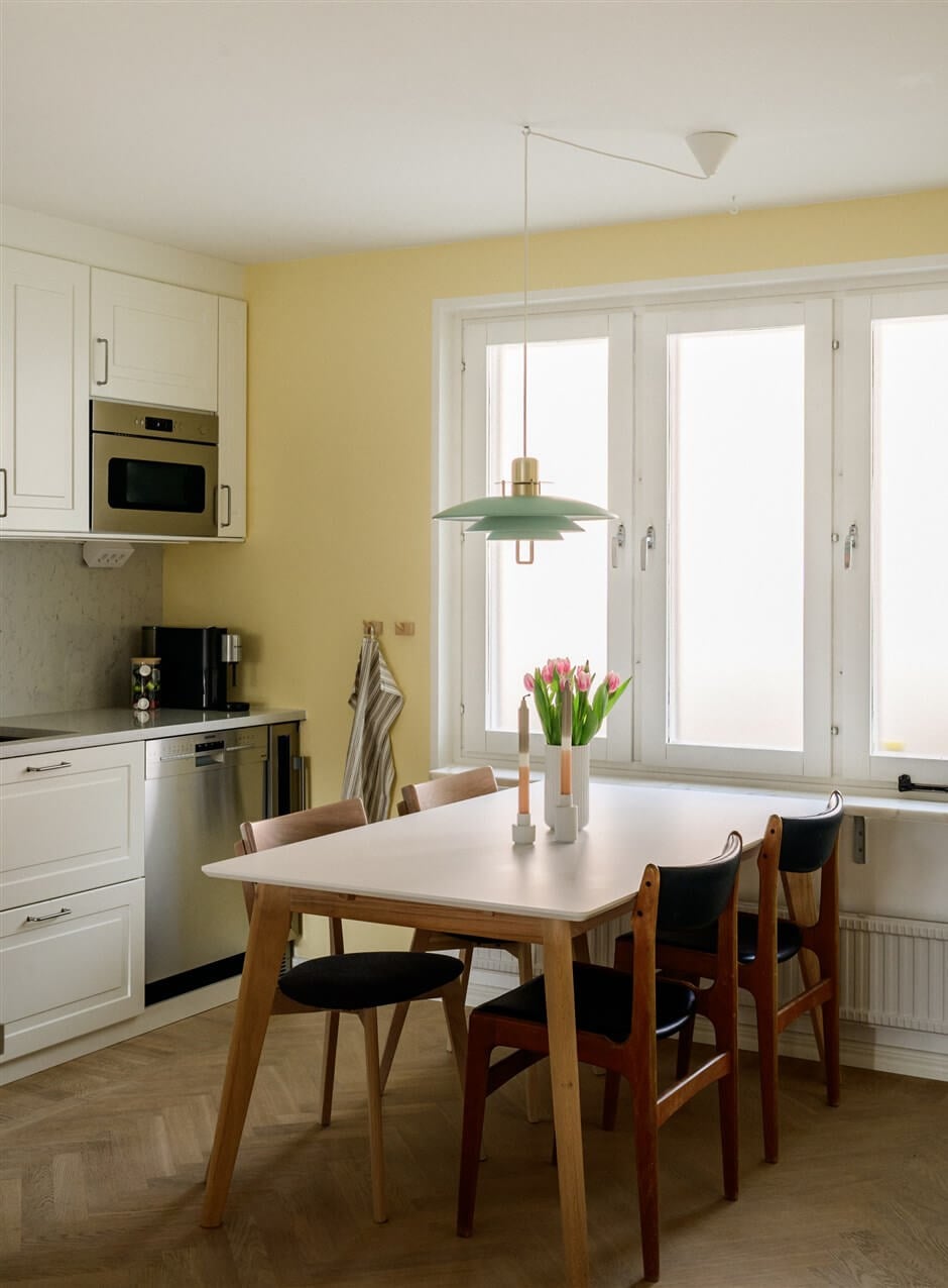 Colorful Rooms in a Bright Two-Bedroom Stockholm Apartment 13 kitchen table