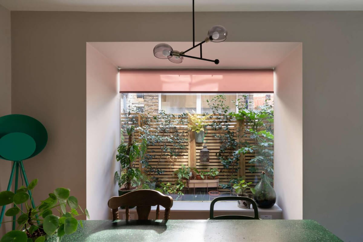 A Colorful Home with a Gold Extension in North London 6 kitchen window
