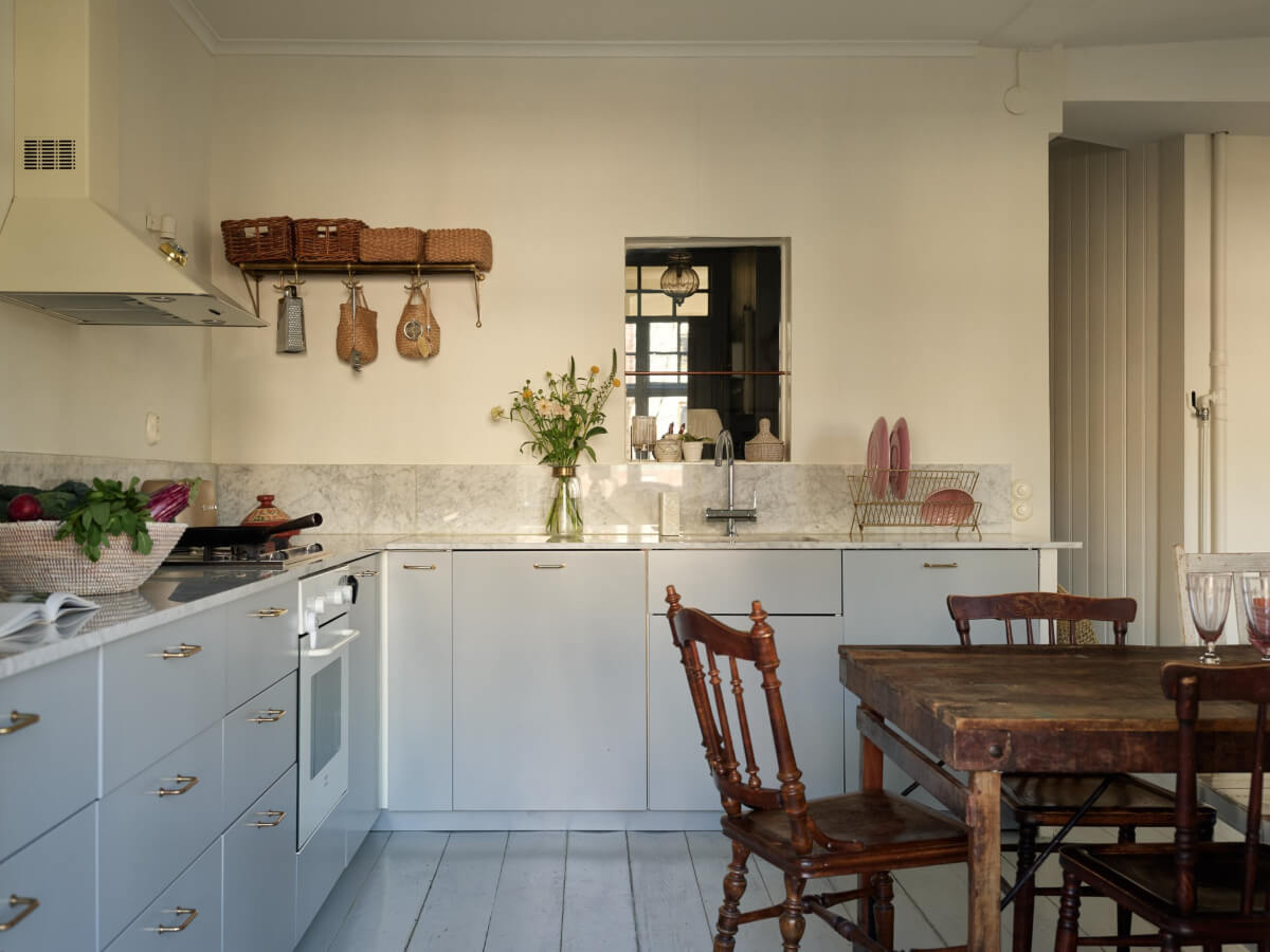 Light-Filled Rooms and a Charming Veranda in a Swedish Apartment 13 kitchen with indoor window