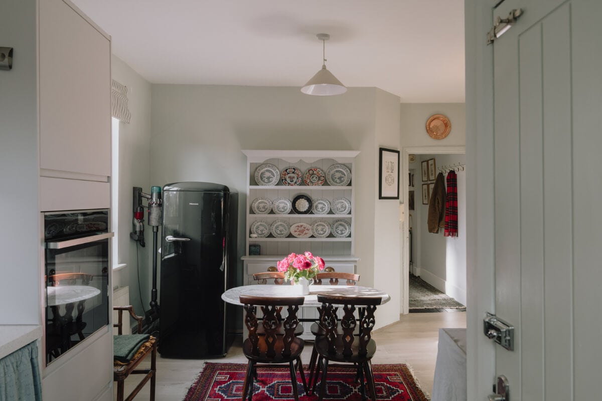 A Carefully Restored Edwardian Apartment with a Garden 8 kitchen with small table