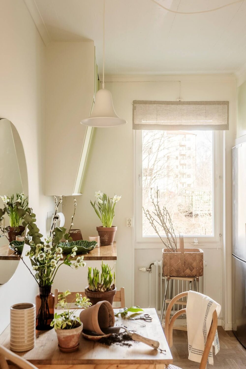 A Two-Bedroom Apartment with the Original Midcentury Kitchen 8 kitchen with small wooden table