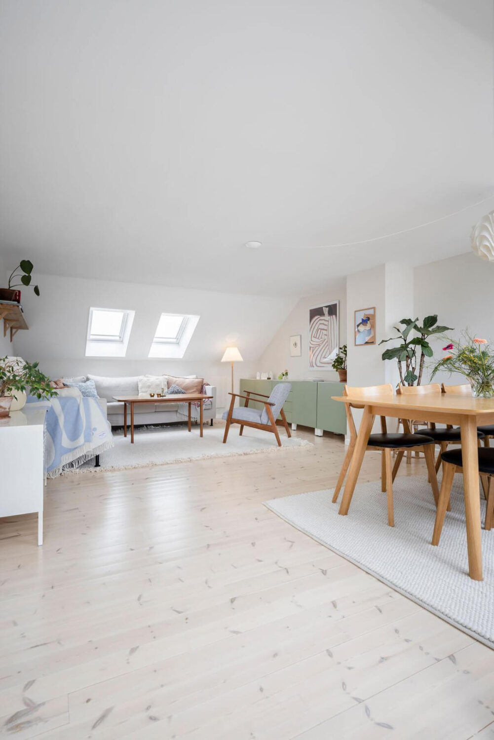 Timeless Charm and Contemporary Design in a 1930s Duplex Apartment 19 light attic living room