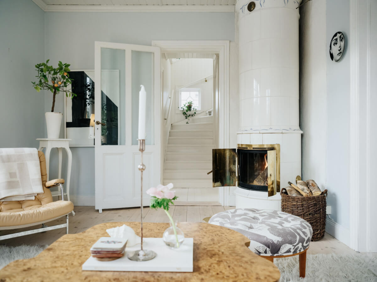 Light-Filled Rooms in a Charming 1907 Swedish Villa 8 light blue living room fireplace