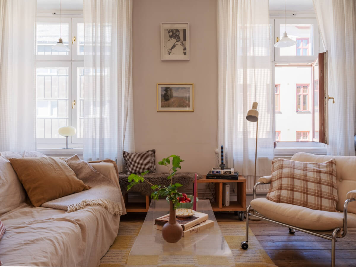 A Small Apartment with Rustic Floorboards and Beige Walls 2 light colored living room dark stained floorboards