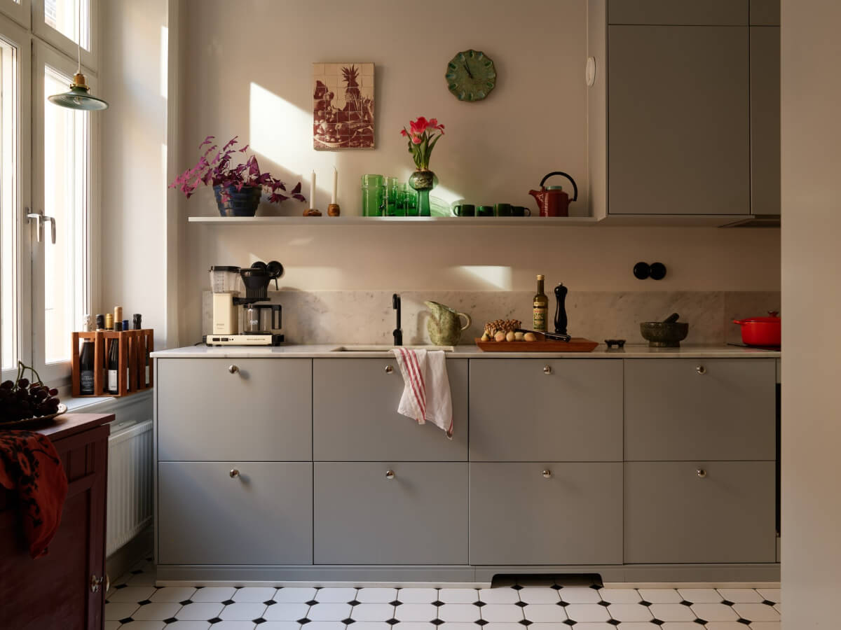 Revisiting a Bright Scandi Apartment with a Gray Kitchen 9 light gray kitchen