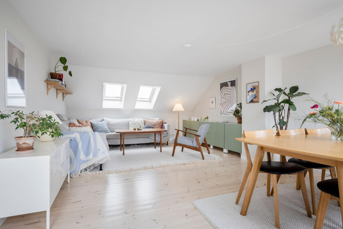 Timeless Charm and Contemporary Design in a 1930s Duplex Apartment 17 light-living-space-slanted-ceilings