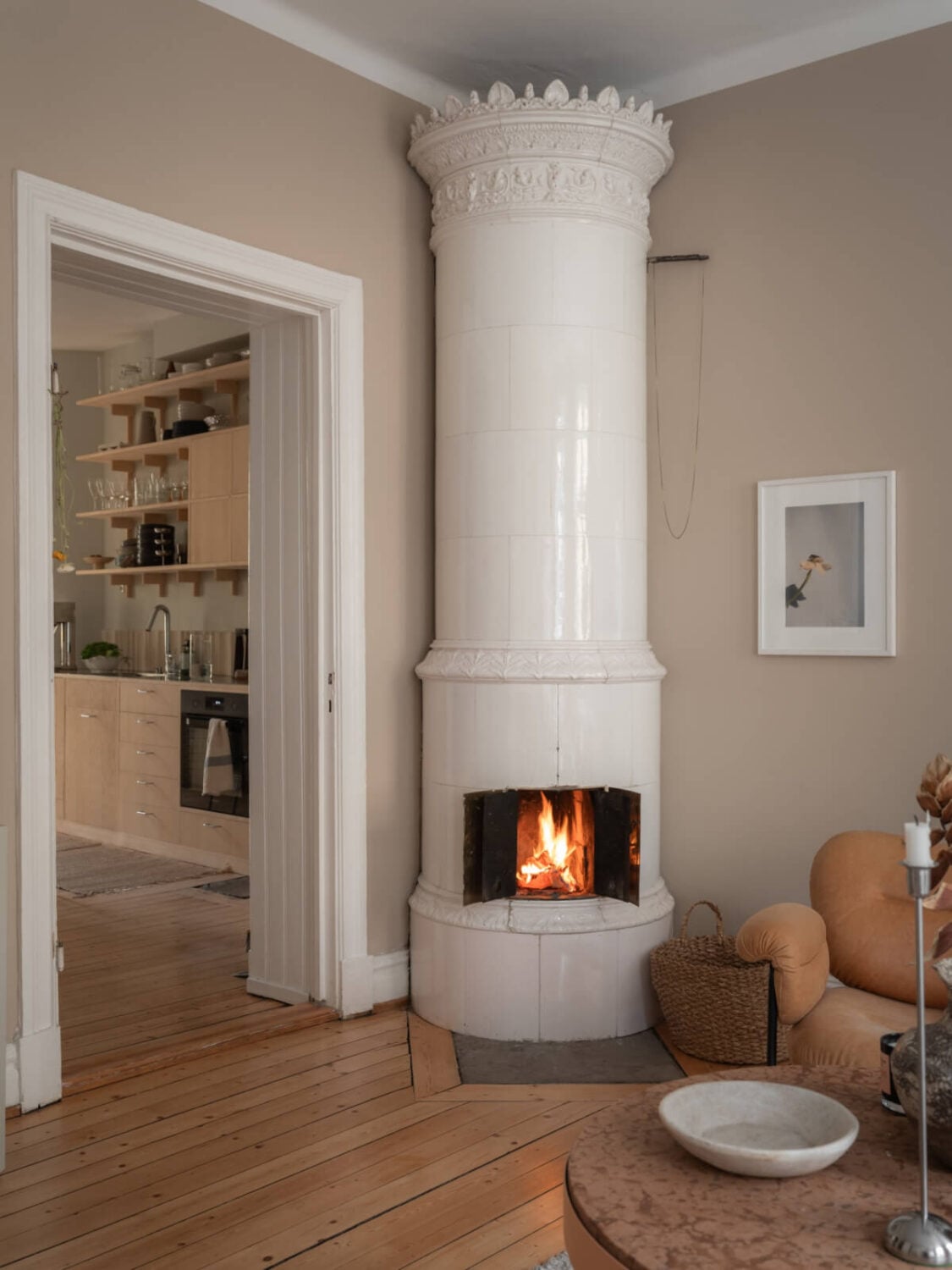 A Calm Color Palette in a Charming Swedish Apartment 8 living room fireplace