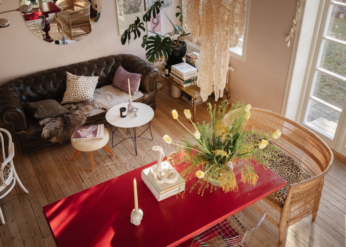 An Amazing Swedish House with Pink and Gray Rooms 2 living room from above red table chesterfield sofa round mirror