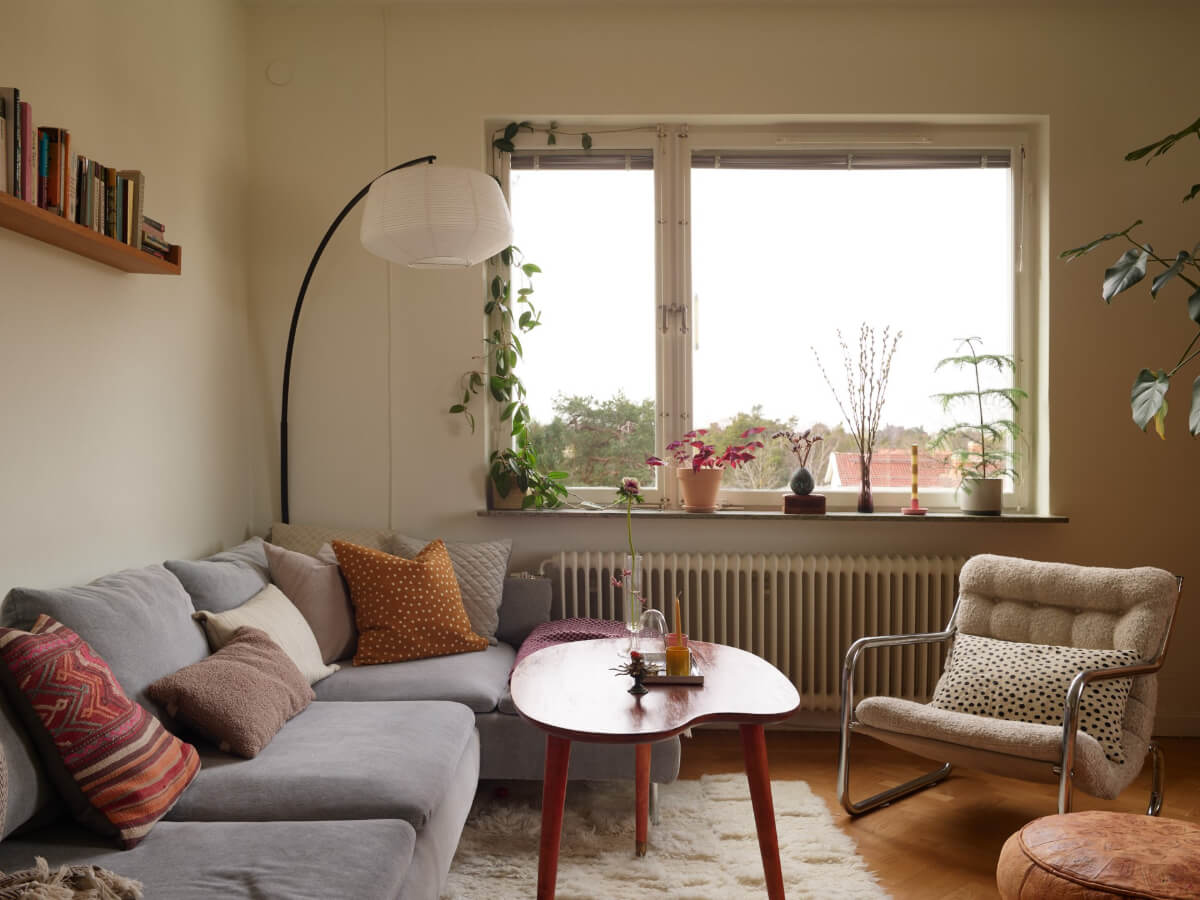 A Renovated 1940s Apartment with Colorful Bedrooms 2 living room large window