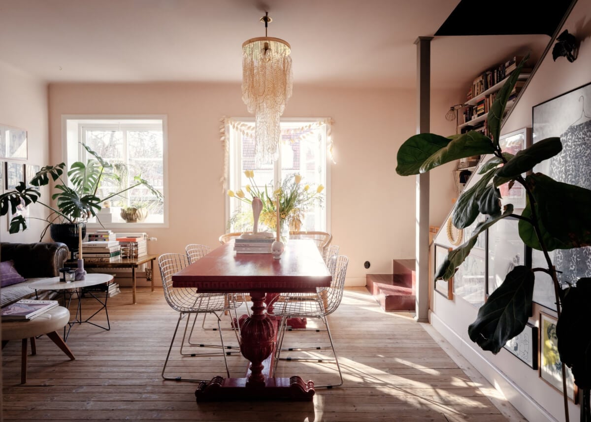 An Amazing Swedish House with Pink and Gray Rooms 7 living room wooden floorboards red dining table