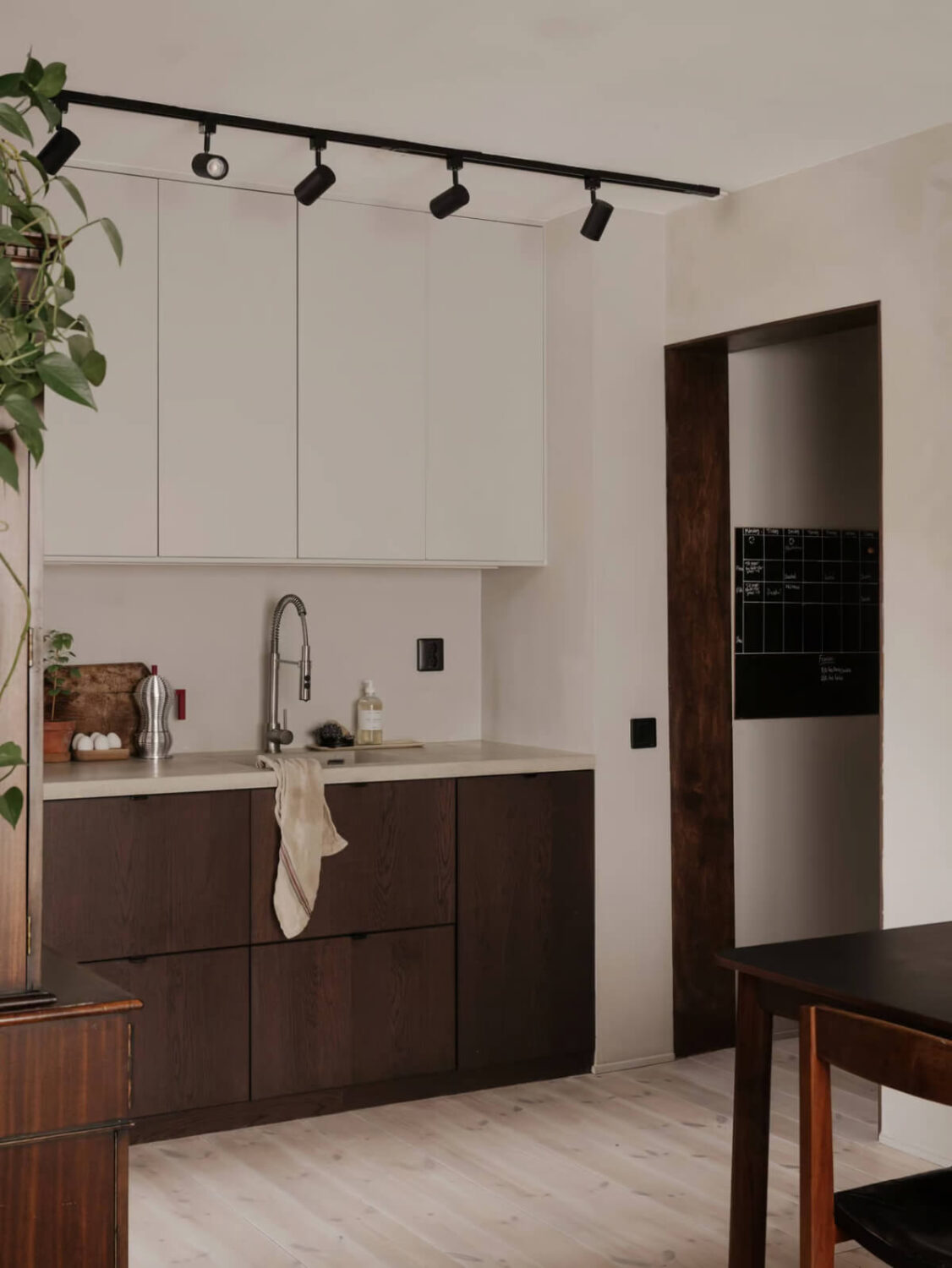 Limewash Walls in Muted Tones in a Swedish Apartment 9 modern wooden kitchen