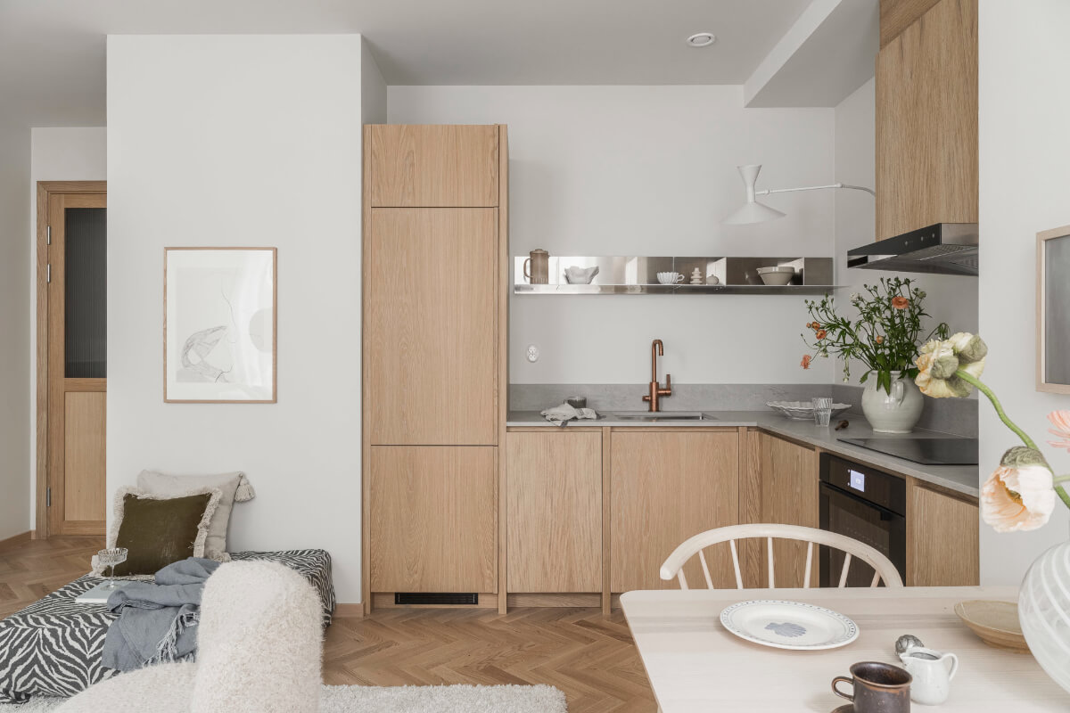 A Light-Filled Contemporary Swedish Apartment 7 oak kitchen brass faucet