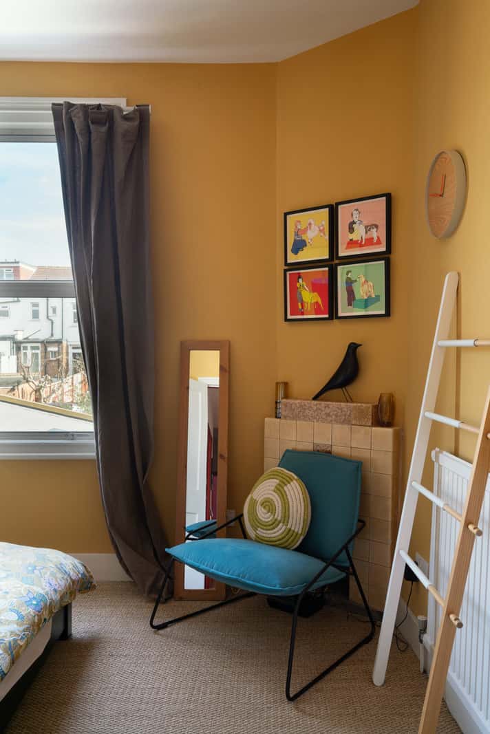 A Colorful Home with a Gold Extension in North London 19 ochre yellow bedroom