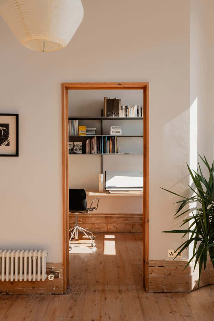 Bespoke Furniture in a Restored Seaside Apartment in England 11 open doorway to home office