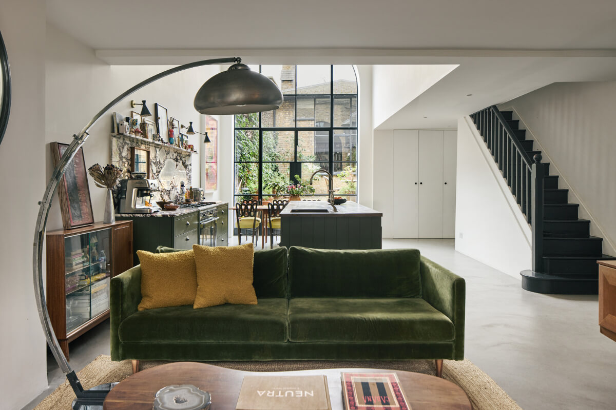 An Early Victorian House with a Unique Barrel-Vaulted Artist's Studio 6 open plan living space concrete floor arched window