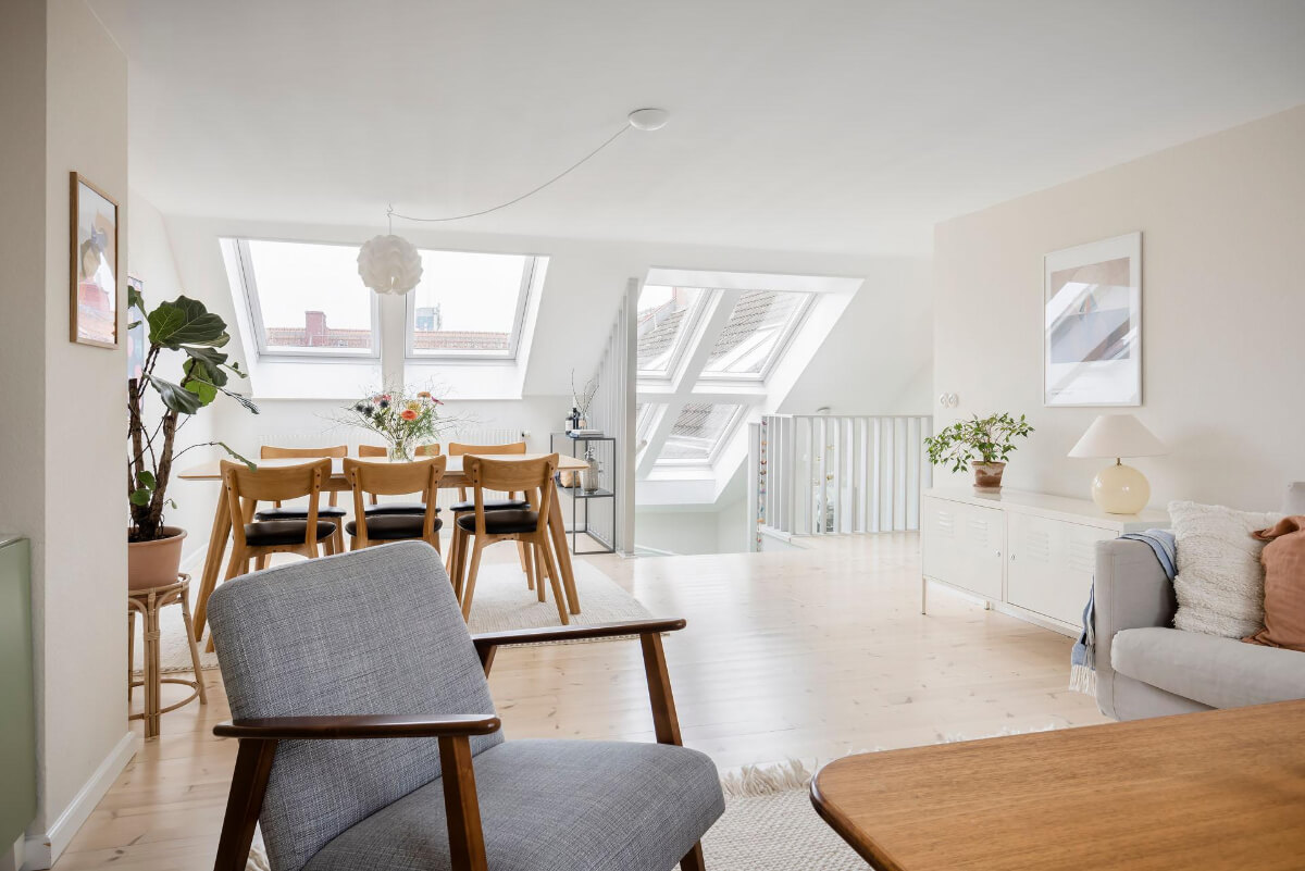 Timeless Charm and Contemporary Design in a 1930s Duplex Apartment 21 open plan living space skylights