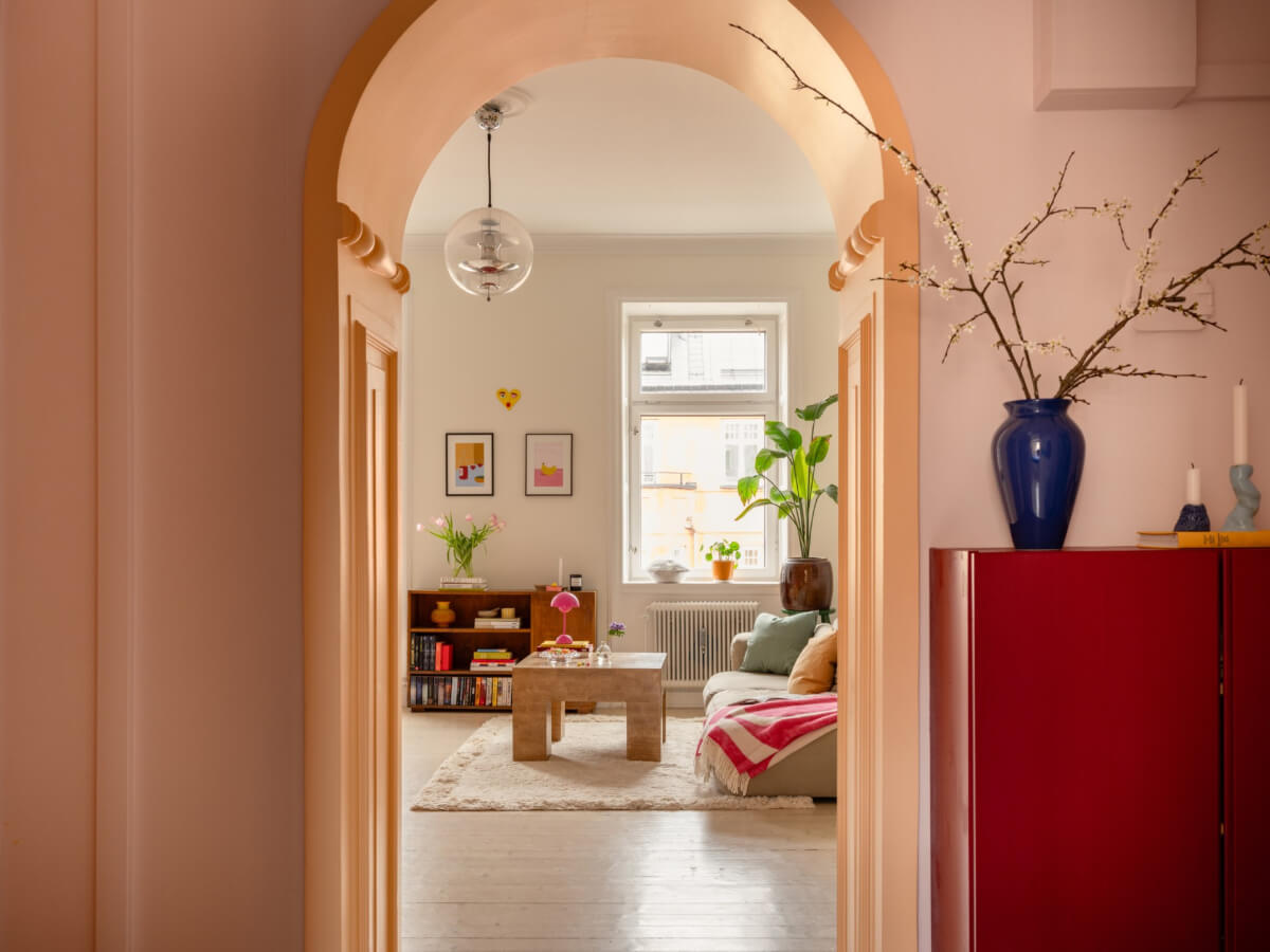 Cheerful Color Accents in a One-Bedroom Stockholm Apartment 11 painted arch doorway