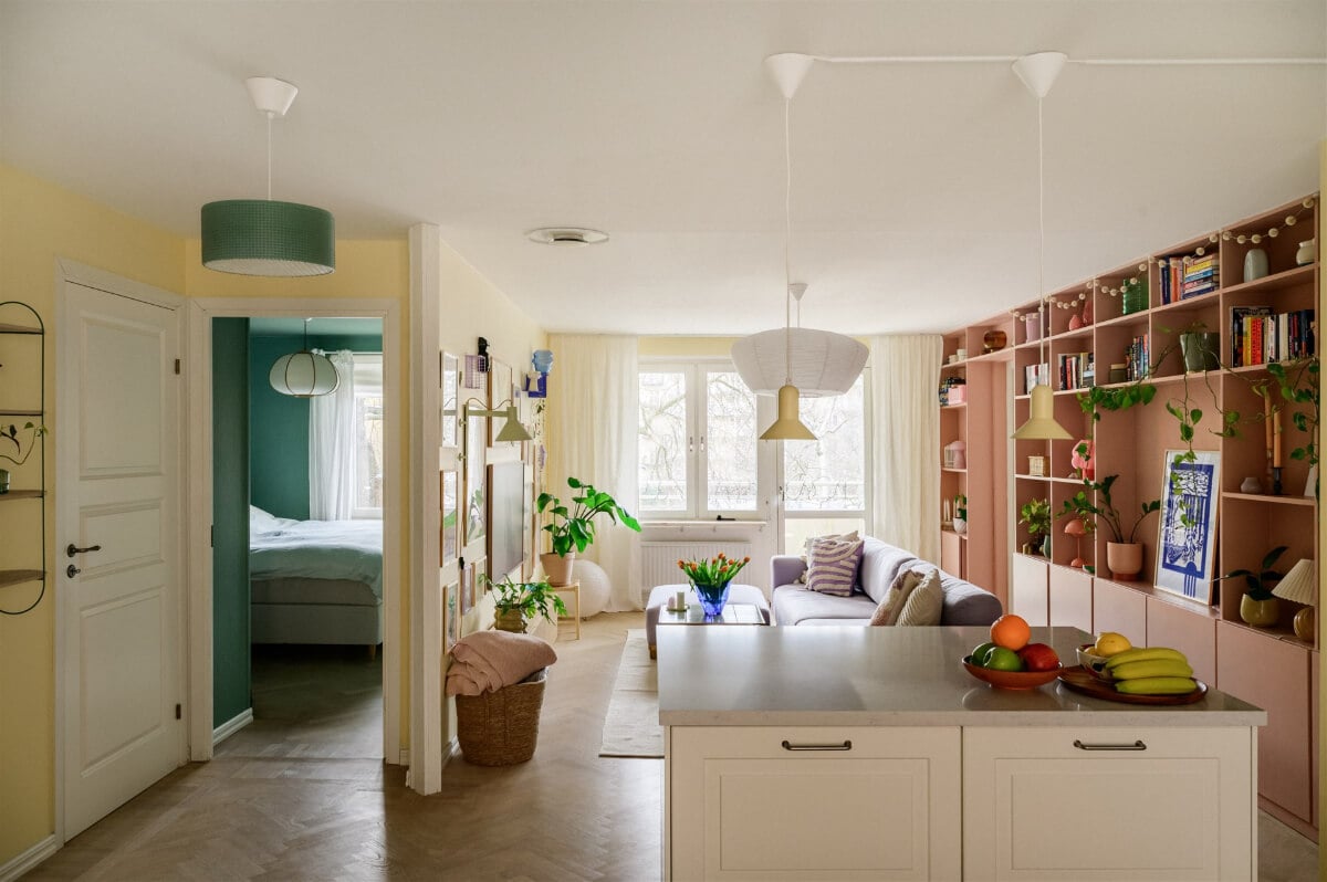 Colorful Rooms in a Bright Two-Bedroom Stockholm Apartment 8 pale yellow and pink living room