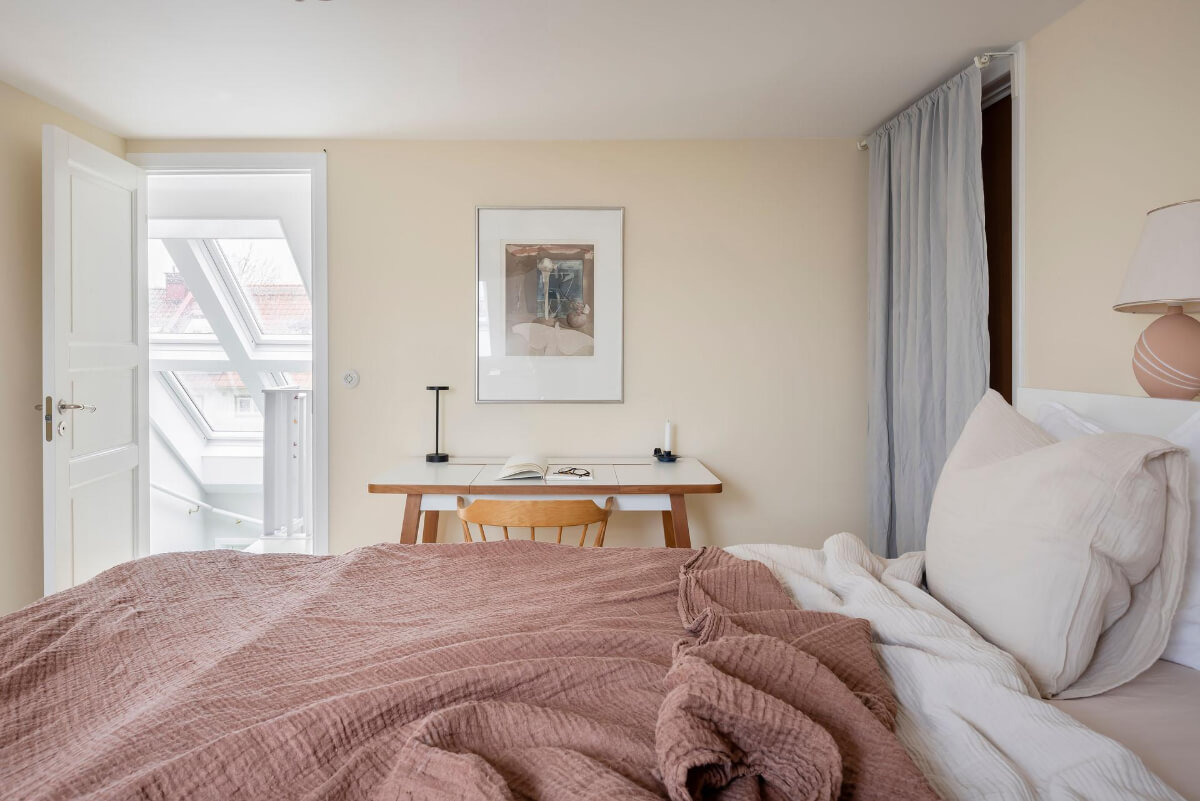 Timeless Charm and Contemporary Design in a 1930s Duplex Apartment 24 pale yellow walls desk bedroom