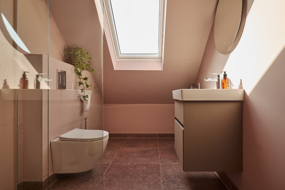 A Beautiful Extended Edwardian House Blends Period Features with Modern Design 30 pink attic bathroom