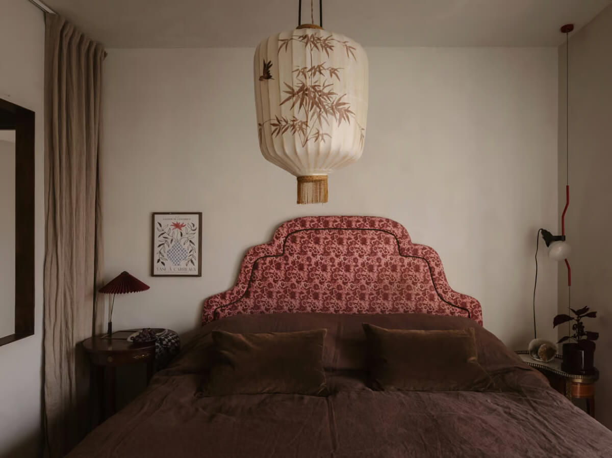 Limewash Walls in Muted Tones in a Swedish Apartment 15 pink floral headboard