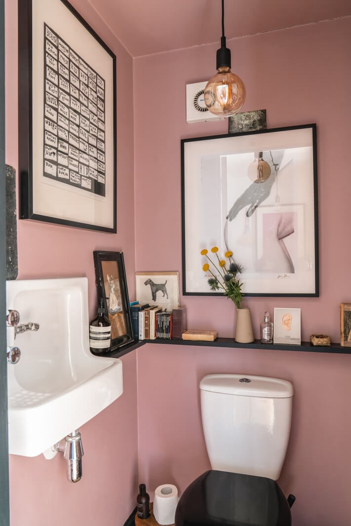 A Cozy Victorian Home Painted in Moody Blue and Gray Tones 15 pink powder room