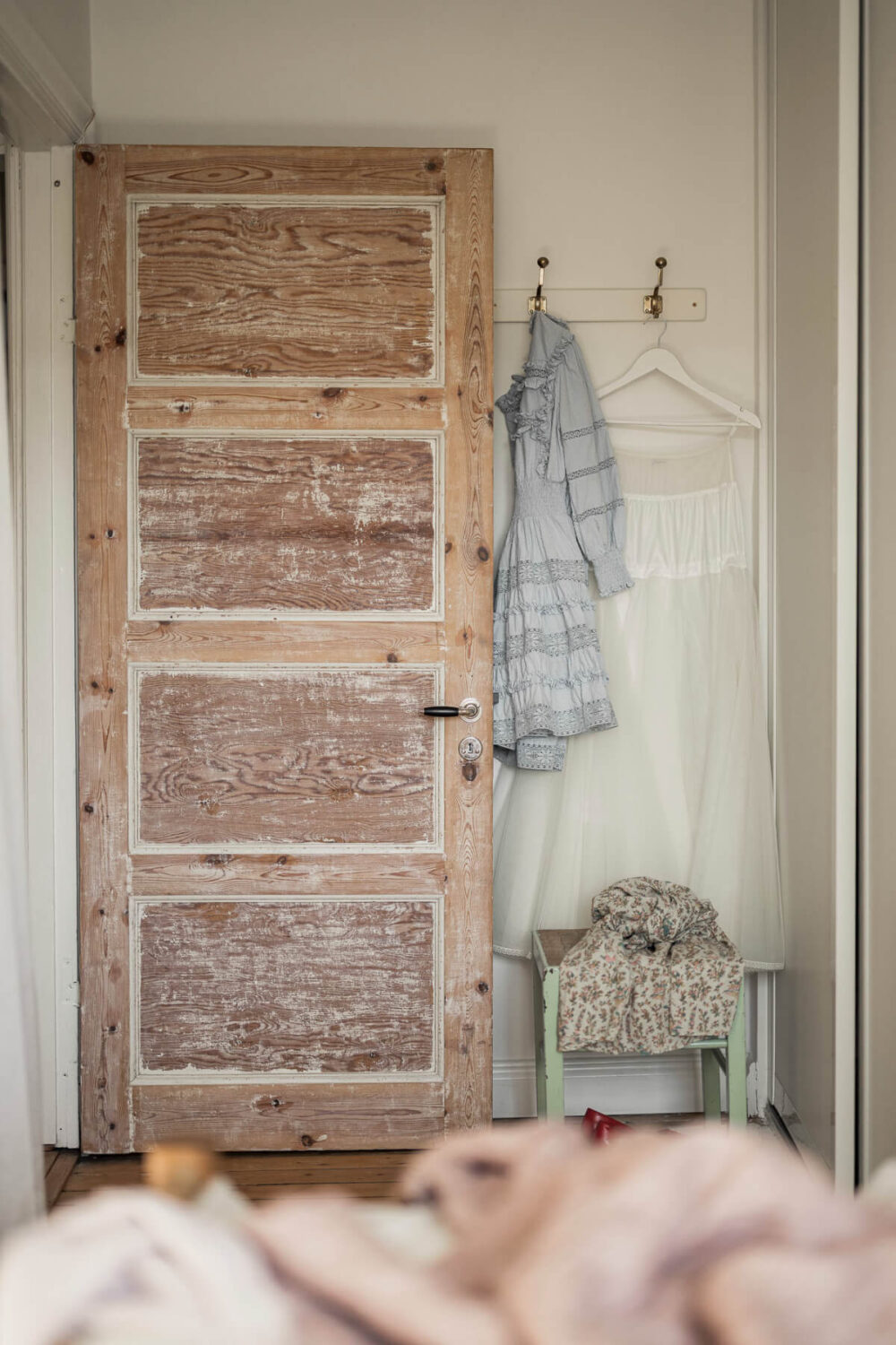 A Swedish Duplex Apartment Inspired by A Danish Summer House 33 raw wooden door