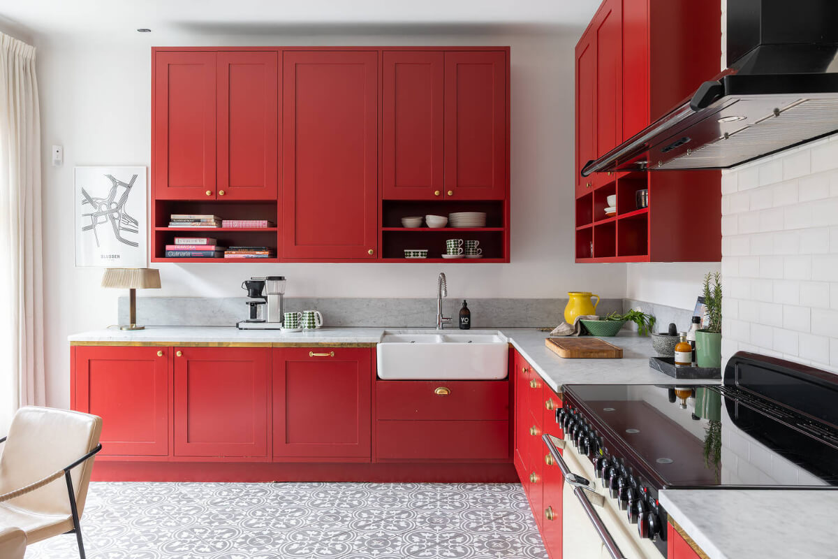 A Red Kitchen in a Grand Swedish Corner Apartment 12 red kitchen marble countertop