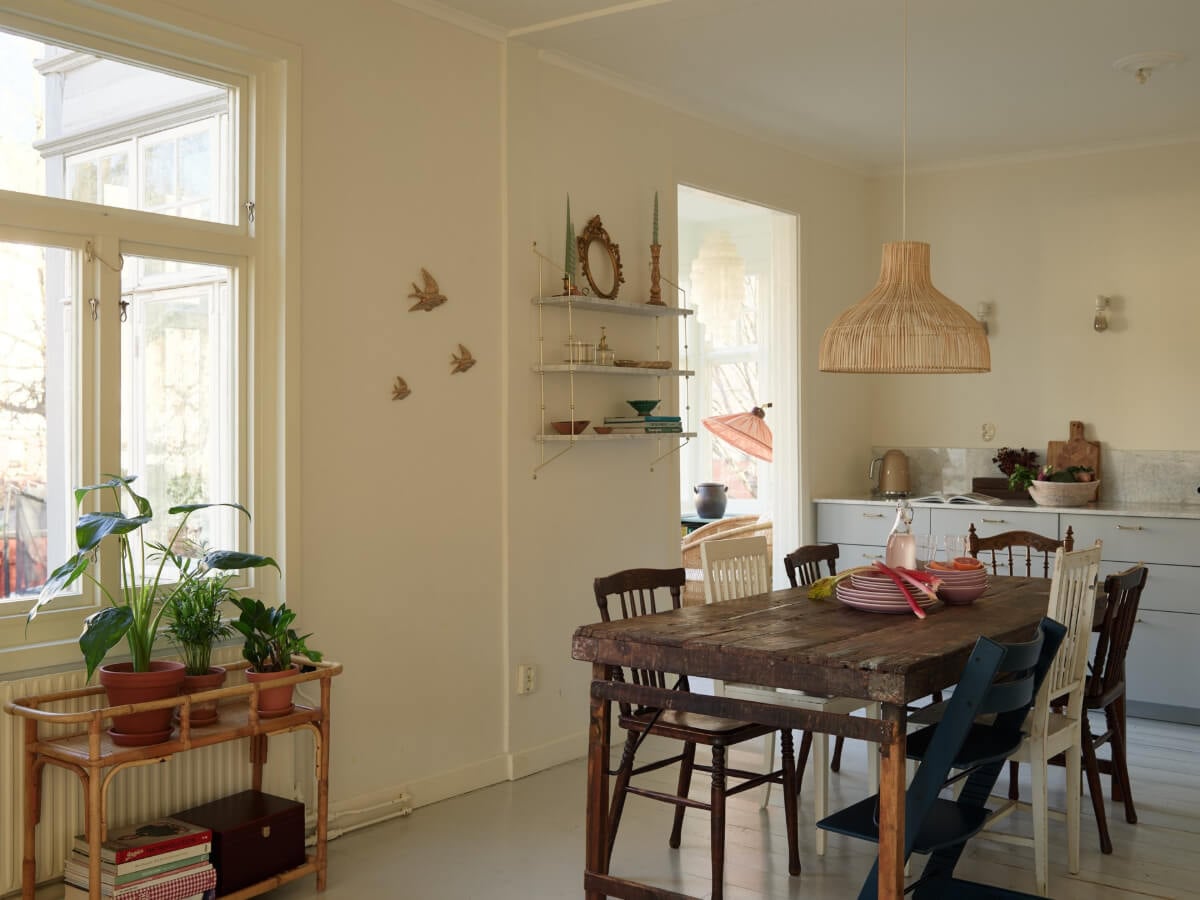 Light-Filled Rooms and a Charming Veranda in a Swedish Apartment 9 rustic wooden dining table