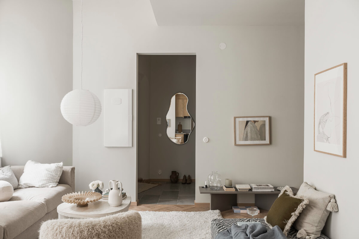 A Light-Filled Contemporary Swedish Apartment 6 scandi living room open doorway hall