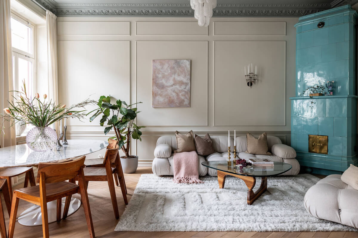 A Luxurious Stockholm Apartment with Period Features and a Blue Fireplace 2 serene living room blue fireplace