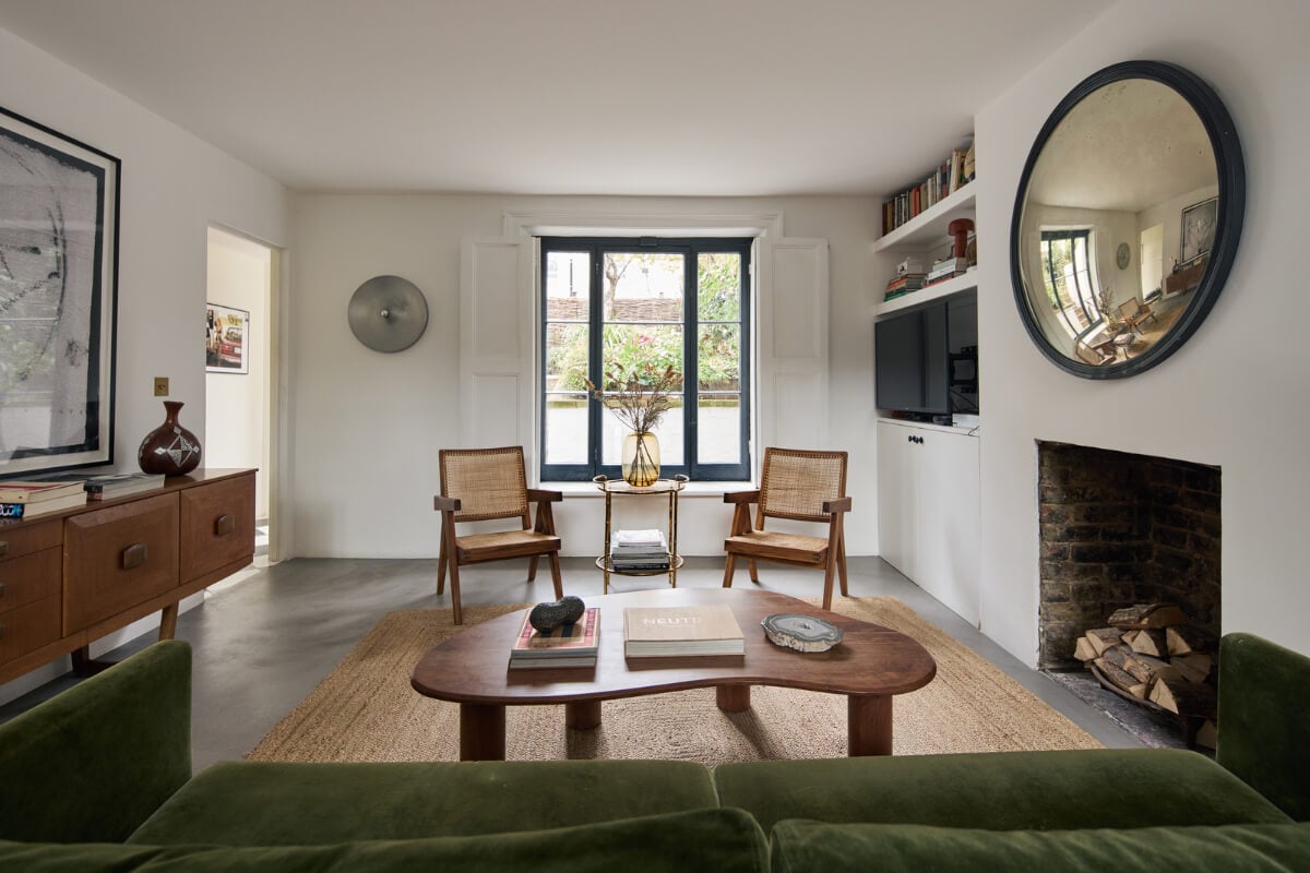 An Early Victorian House with a Unique Barrel-Vaulted Artist's Studio 7 sitting room fireplace green velvet sofa