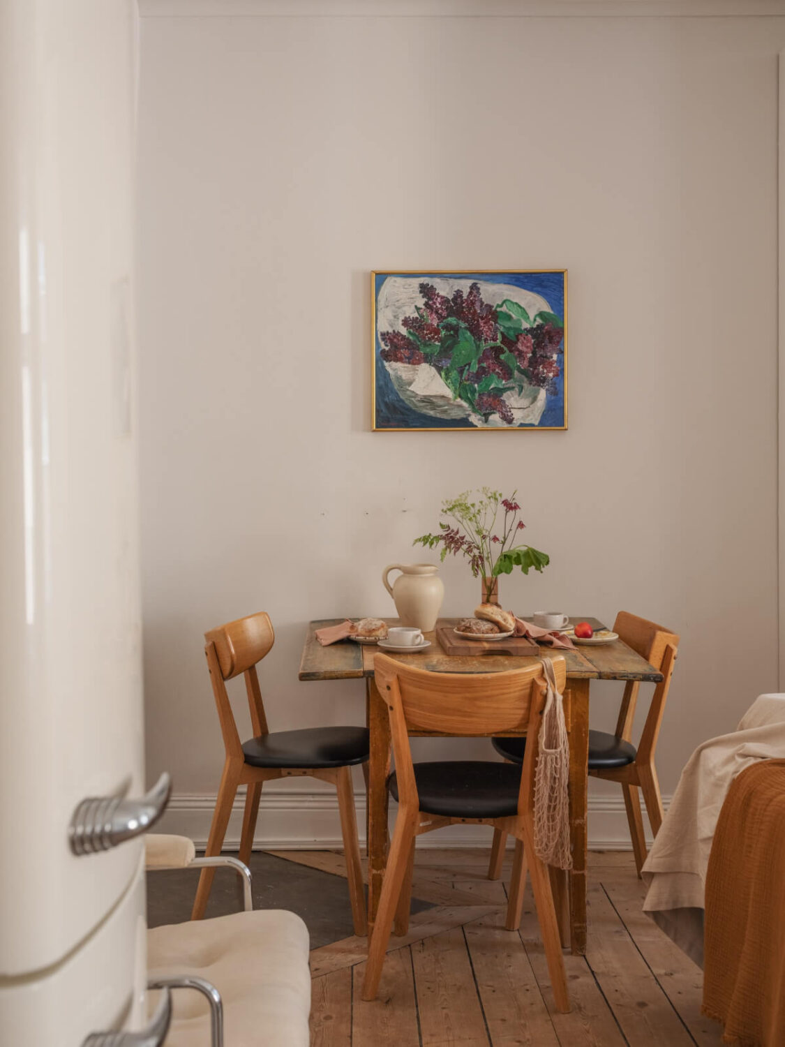 A Small Apartment with Rustic Floorboards and Beige Walls 11 small rustic wooden dining table