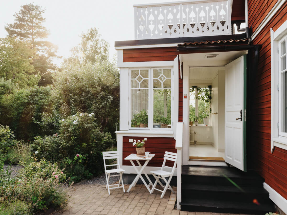 Light-Filled Rooms in a Charming 1907 Swedish Villa 2 small sitting area red painted swedish villa