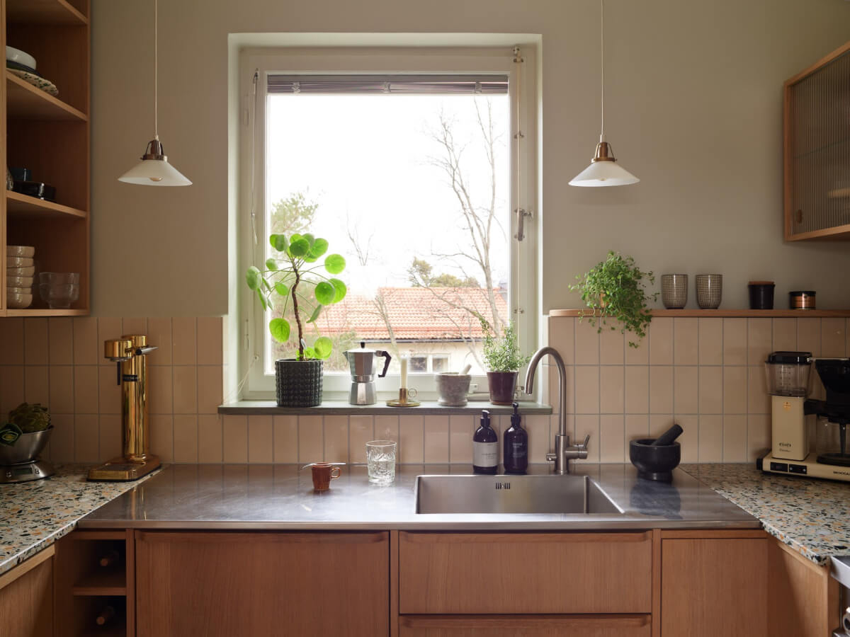 A Renovated 1940s Apartment with Colorful Bedrooms 13 stainless steel countertop