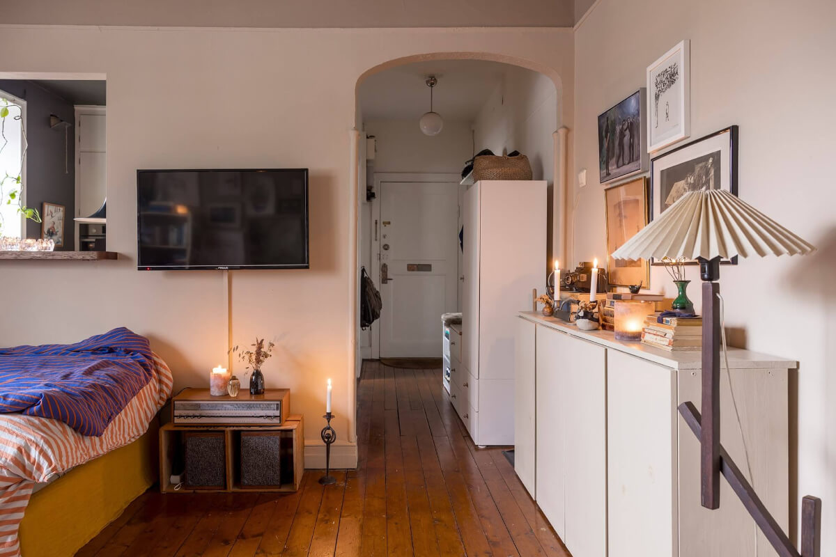 A Cozy Studio Apartment in a 1930s Building 6 studio apartment open doorway to hall