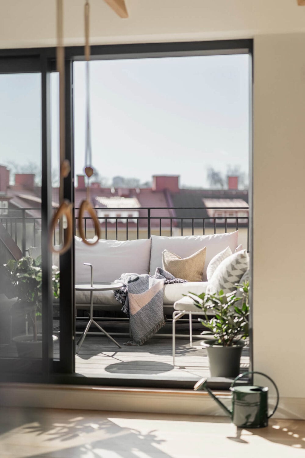 A Swedish Duplex Apartment Inspired by A Danish Summer House 5 sunny balcony living room