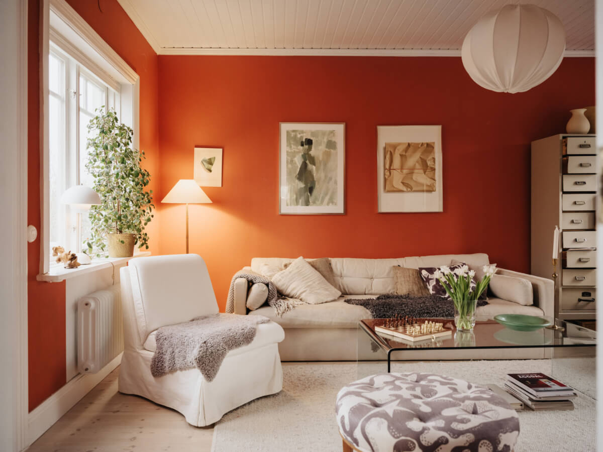 Light-Filled Rooms in a Charming 1907 Swedish Villa 16 terracotta colored living room