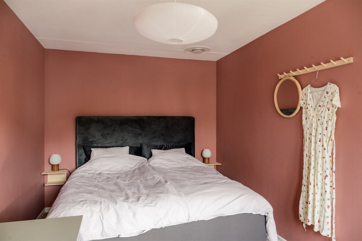 Colorful Rooms in a Bright Two-Bedroom Stockholm Apartment 18 terracotta pink bedroom